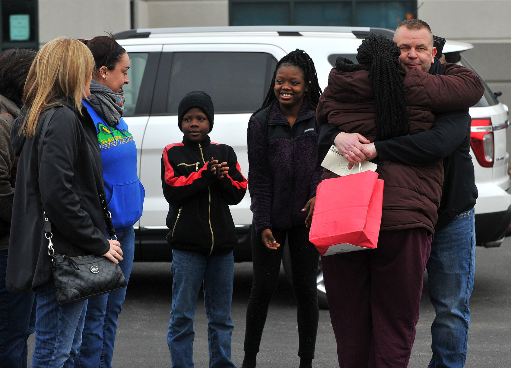 Moline police and Moline Municipal Credit Union give car away